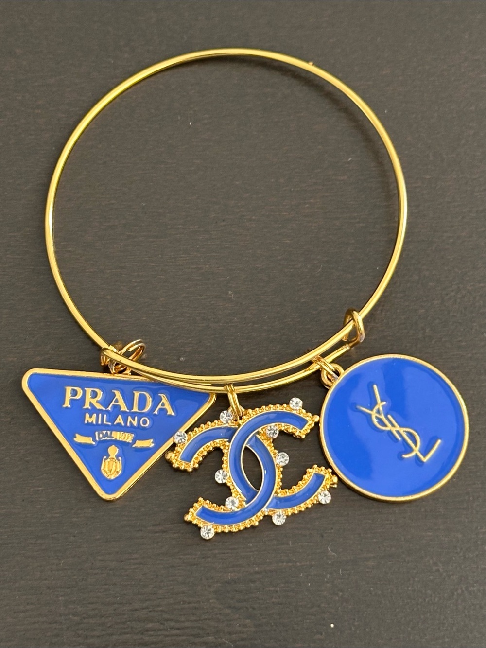 No Boundaries Gold Bangle Bracelet with Blue Logo Charms